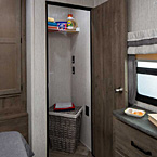 Spacious Destination Trailer bedrooms include a walk-around bed with large mirrored wardrobes, a dresser and washer/dryer prep, 110V outlets and a handy USB charging port.
