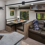 382 THS Drop your gear in the cargo area and spread out. This slideout has large windows for fresh air, and night roller shades to enhance privacy. Both the 45” booth dinette and sofa have extra storage underneath. Convenient USB ports and energy efficient LED lights are located throughout.